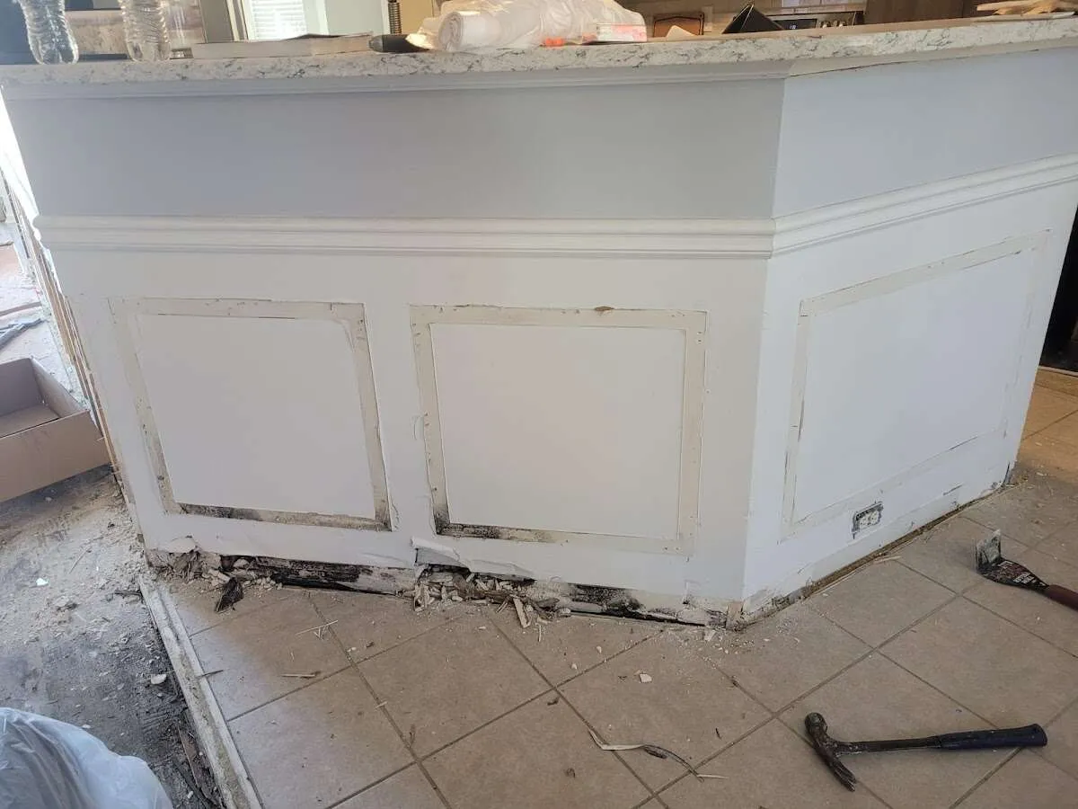 Water damage and mold on kitchen during Sewage Cleanup & Sanitation in Whitefish Bay
